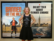 Franke James stands in front of her posters at the Ferry Terminal in Halifax, NS, Sept.2013
