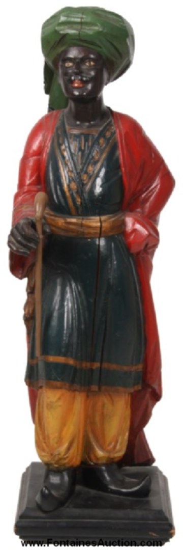 Standing carved cigar store figure of an Arabian (or Turkish) man wearing a turban, 38 inches tall (est. $7,500-$12,500).
