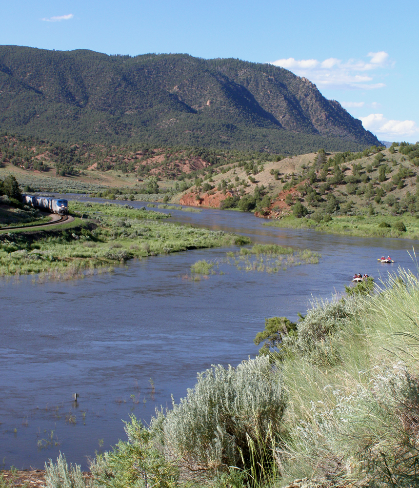 Adventure Team Challenge teams float the Colorado River east of State Bridge. Photograph by Richard Rhinehart.