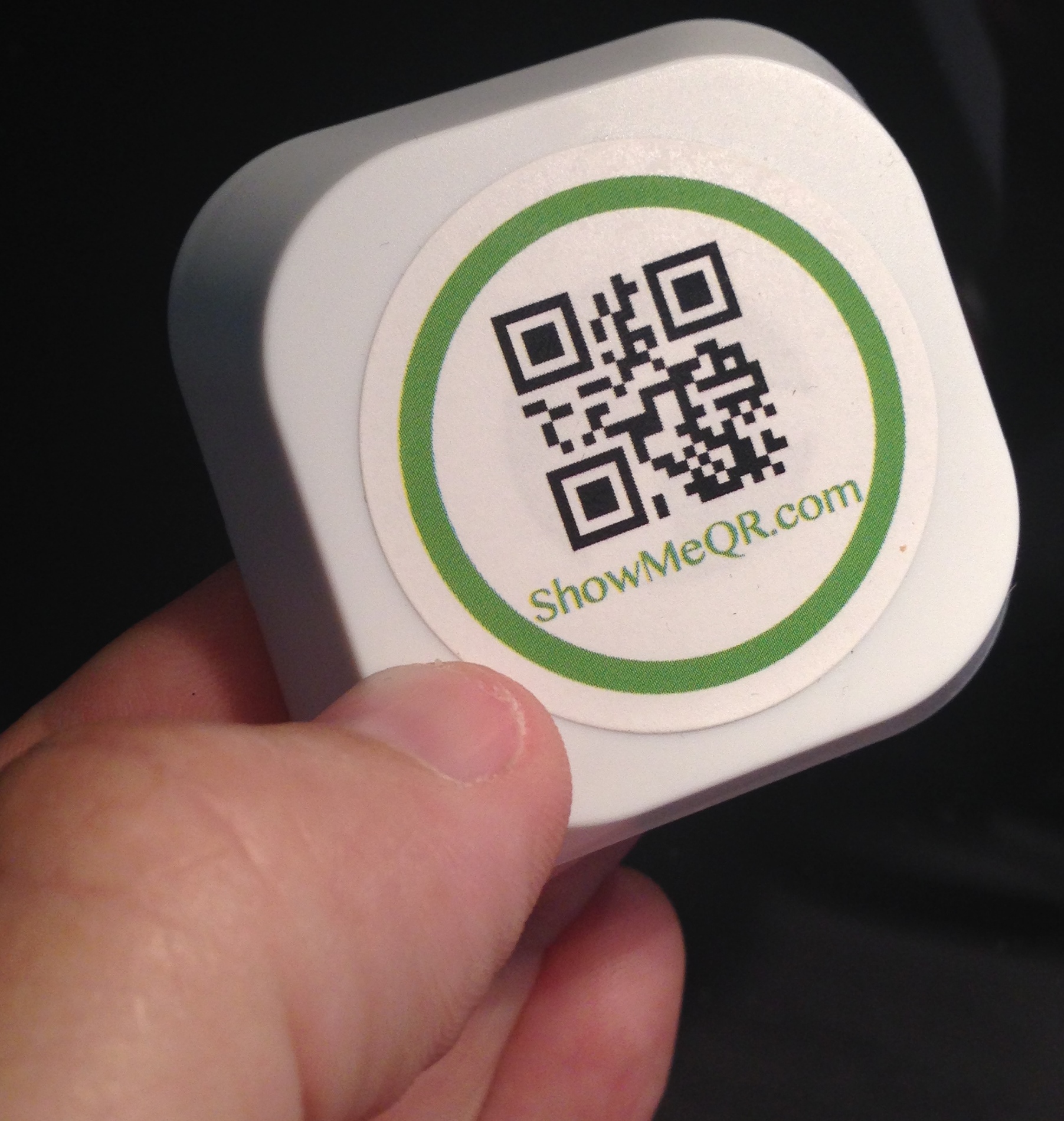 The printed proprietary QR codes can be placed on (or near) objects.