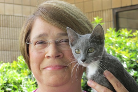 Nurse manager Leslie Ware and kitten Moxie.