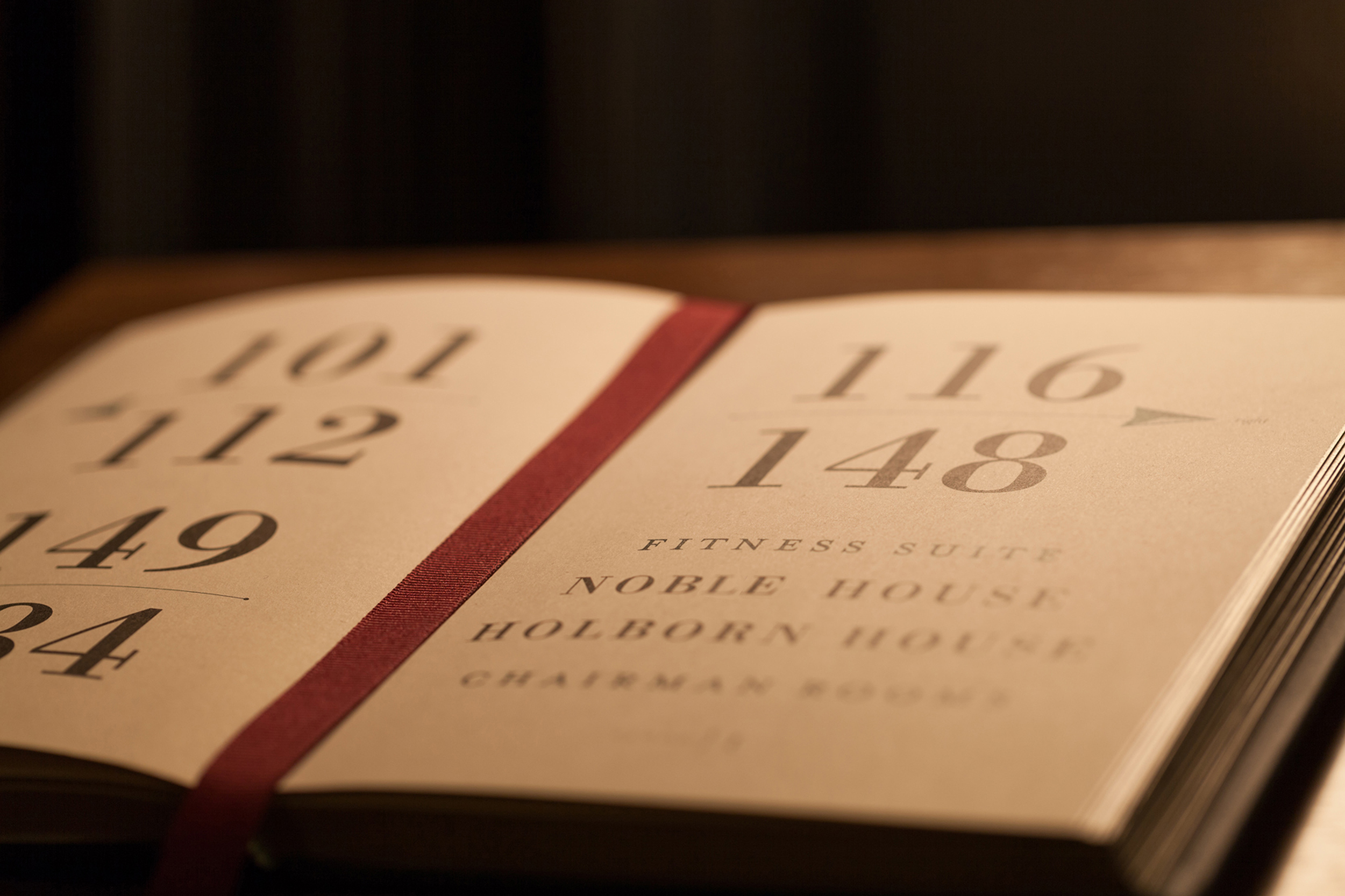 Hand-crafted leather bound books Environmental Signage Rosewood London