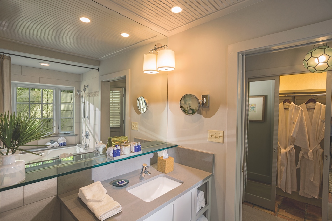 The bathrooms feature sleek lines and windows that open to a private meditation garden.