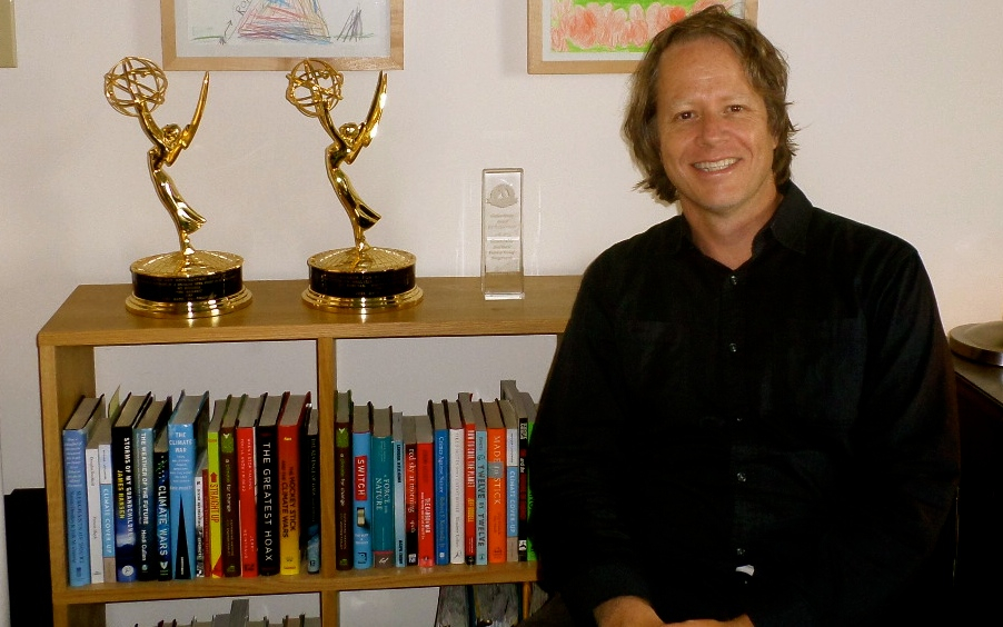 Producer Joel Bach with Emmys and Golden Goody Award for Climate Change Storytelling