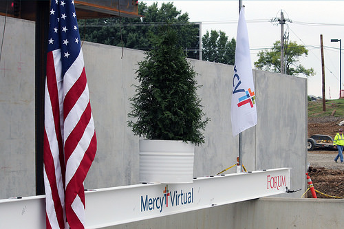 The final beam of the world's first virtual care center is ready to be hoisted into place.