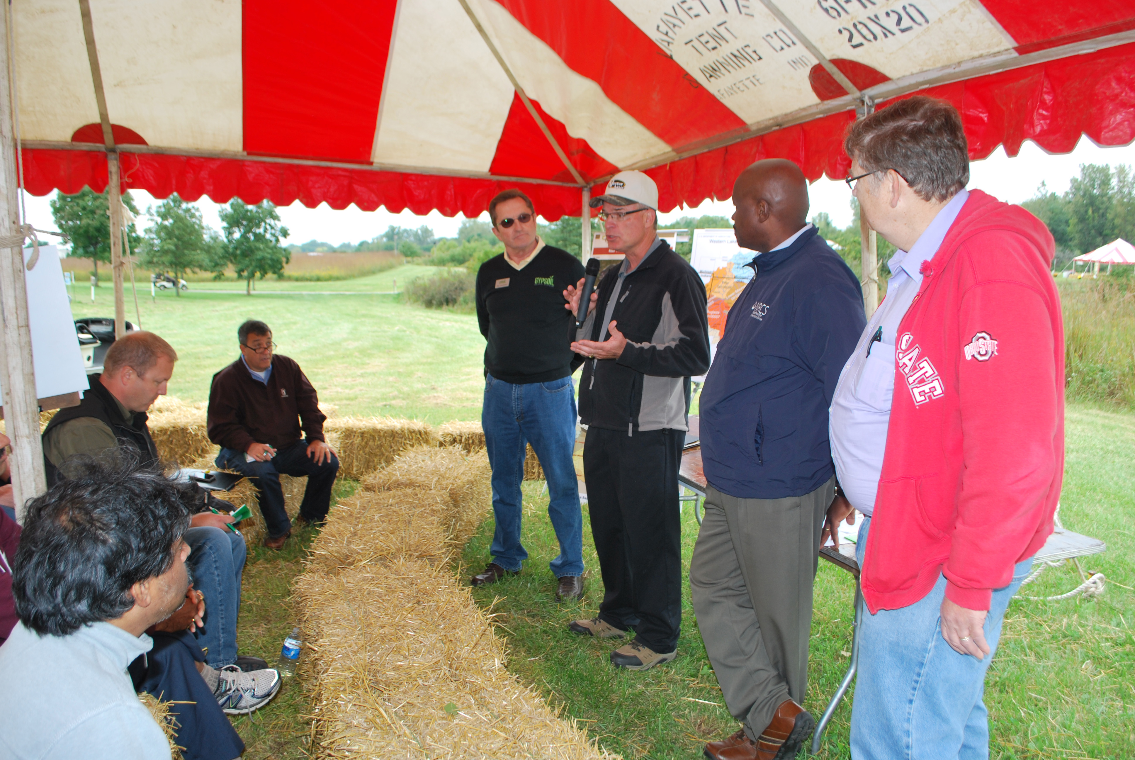 Joe Nester of Nester Ag, Bryan, OH, discusses gypsum's positive impact on reducing phosphorus runoff from farm fields at a press conference at The Ohio State University's (OSU) Farm Science Review in