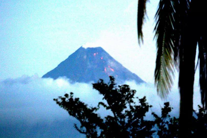 The Mayon Volcano shows increased activity and threatens to erupt as lava flows from the crater.