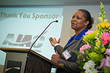 On July 25, 2014, Demetria “Lynn” Strickland speaks at Pacific Northwest Aerospace Alliance (PNAA) Women in Aerospace Luncheon in Seattle, WA.