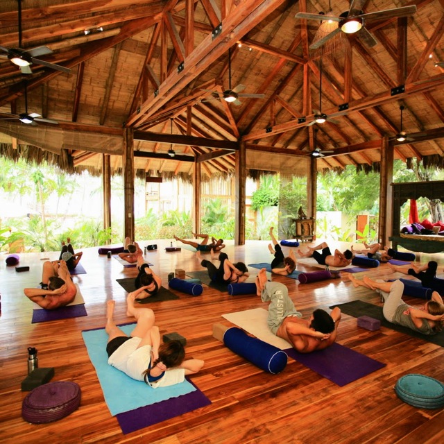 Enjoy afternoon yoga sessions in an open-air shala with Vajra Sol Yoga Adventures.
