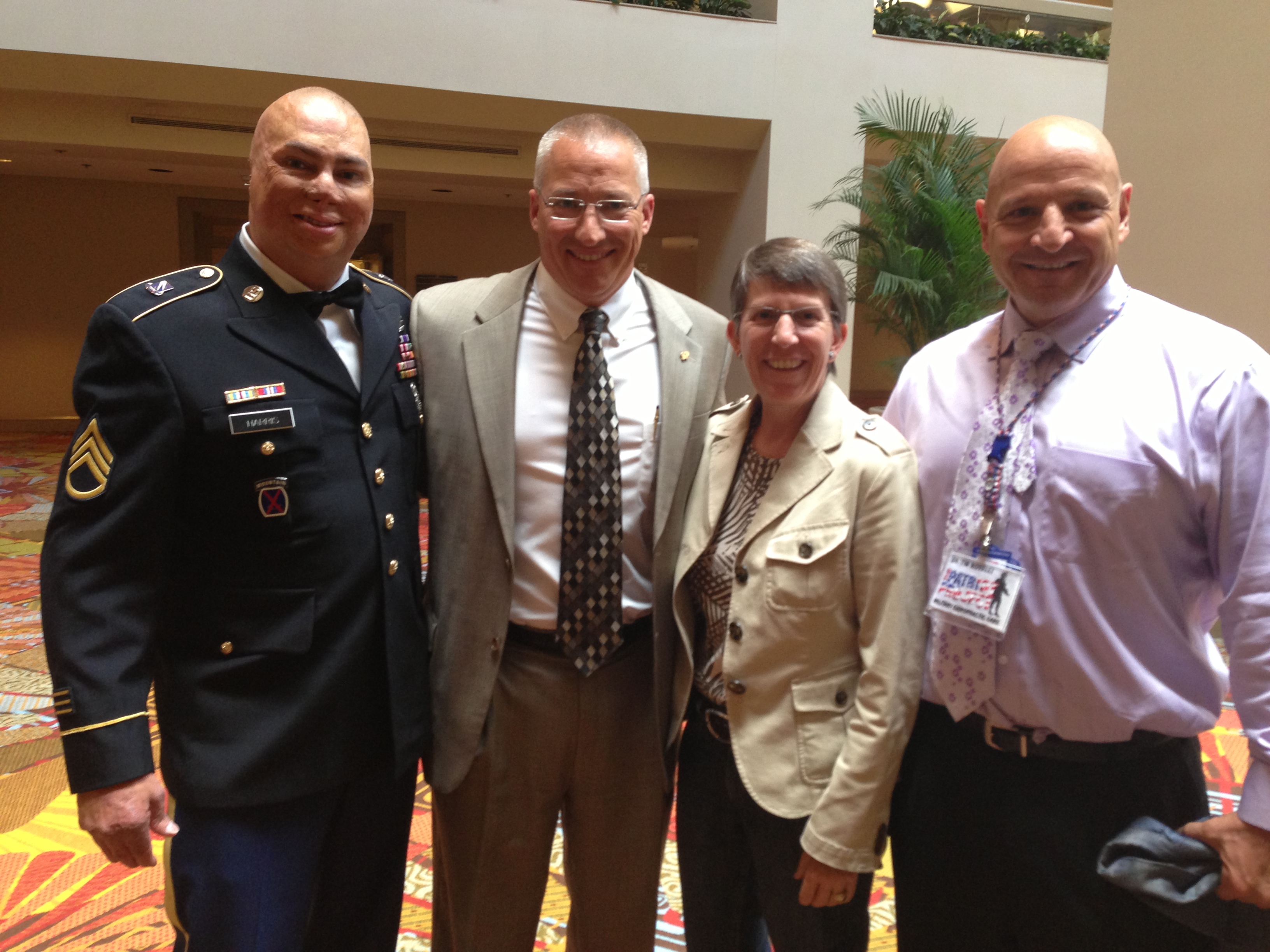 Patriot Project supporters retired US Army Staff Sgt. Shilo Harris (l-r); DuBois; retired US Army Brig. Gen. Rebecca Halstead; and Novelli, DC, pose together at FCA’s National Conference in August.