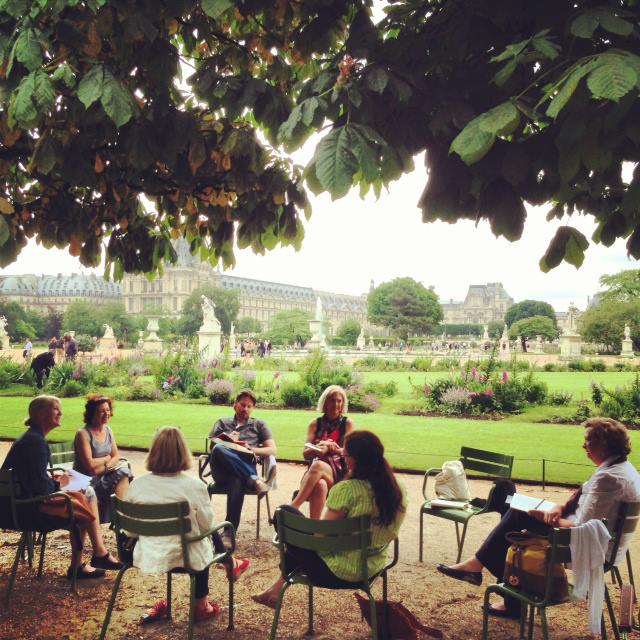 Left Bank Writers Retreat group in discussion amid beautiful Paris scenery.