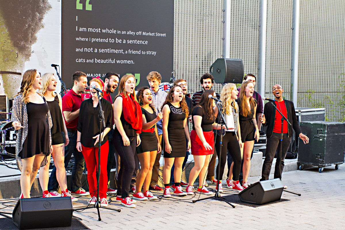 Catholic University of America Redline A Capella Perform at Monroe Street Market Grand Opening