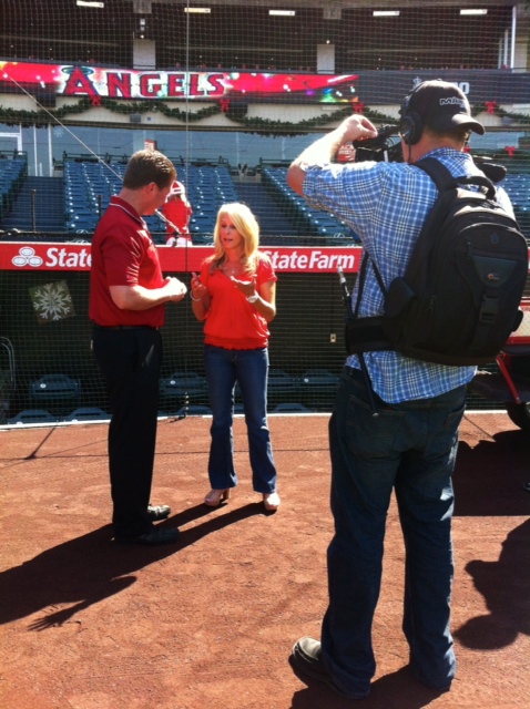 Discover Orange County™ Filming Day Behind-The-Scenes at Angel Stadium of Anaheim. Lisa Interviewing Brian Sanders, Sr. Director of Ballpark Operations.