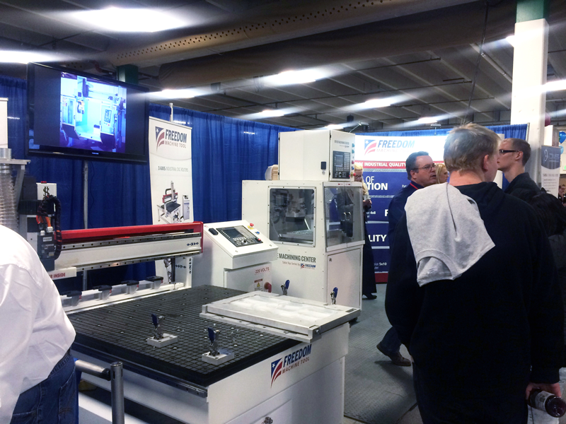 Students see live machine demos of CNC Routers at the SOCOM Expo 2014