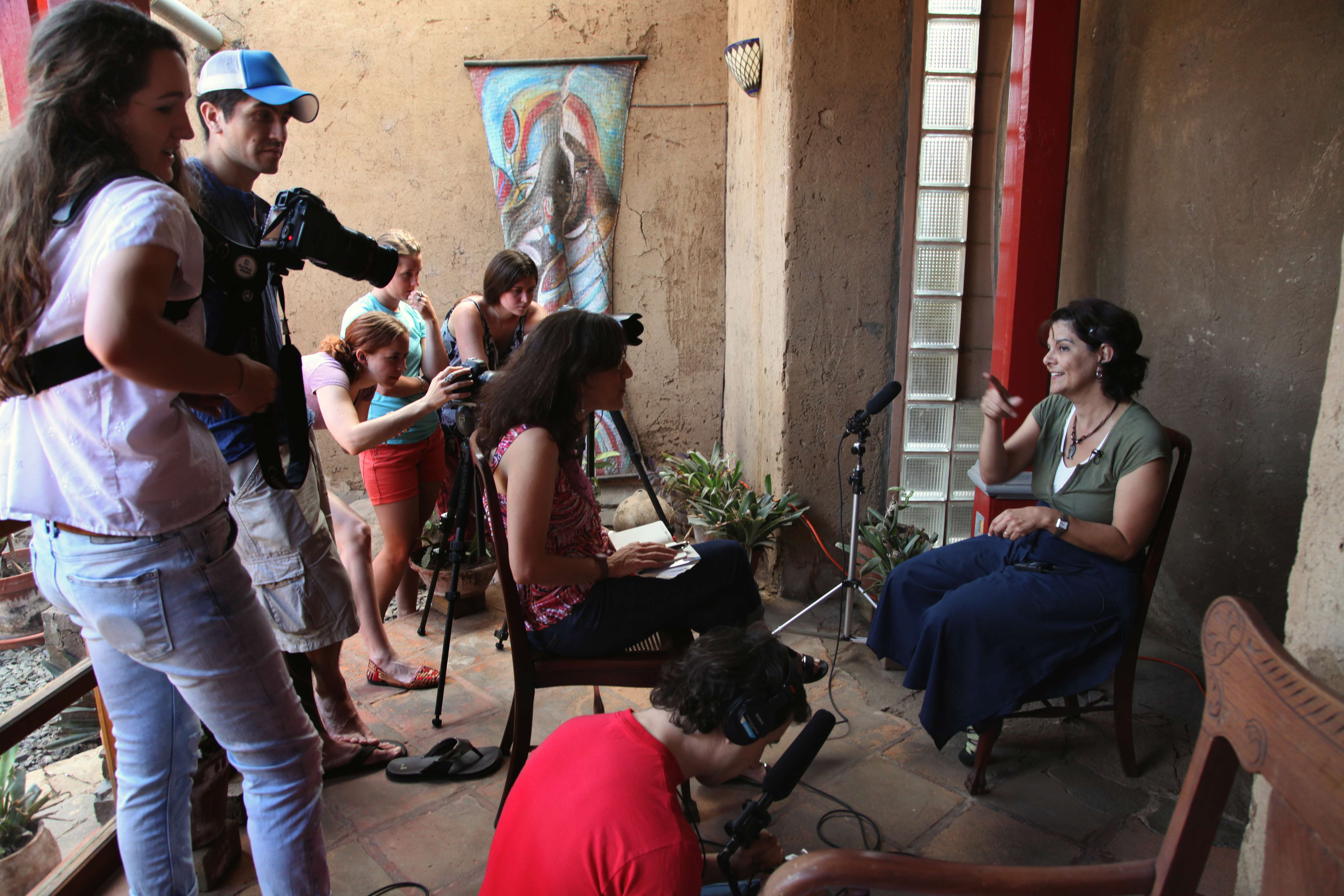 Muriel Hasbun received the 2014 Howard Chapnick grant. Above, Corcoran students and Muriel Hasbun interview Beatriz Deleón about galería el laberinto in El Congo, El Salvado. ©Susan Sterner