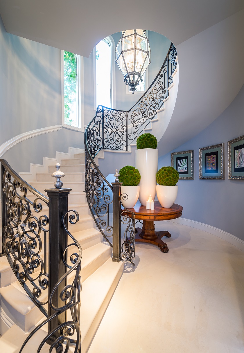 Limestone and Wrought Iron Spiral Staircase