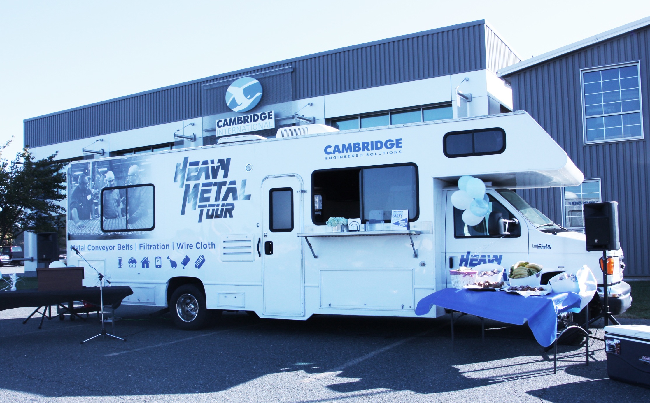 Super graphics of conveyor belts and customized metal and wire cloth features adorn the Heavy Metal RV.