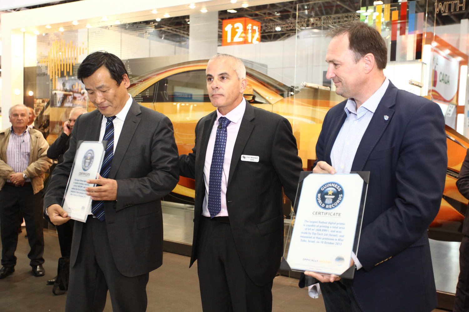 Dip-Tech CEO present Guinness Certificates on Printed Glass to TNG and sedak
