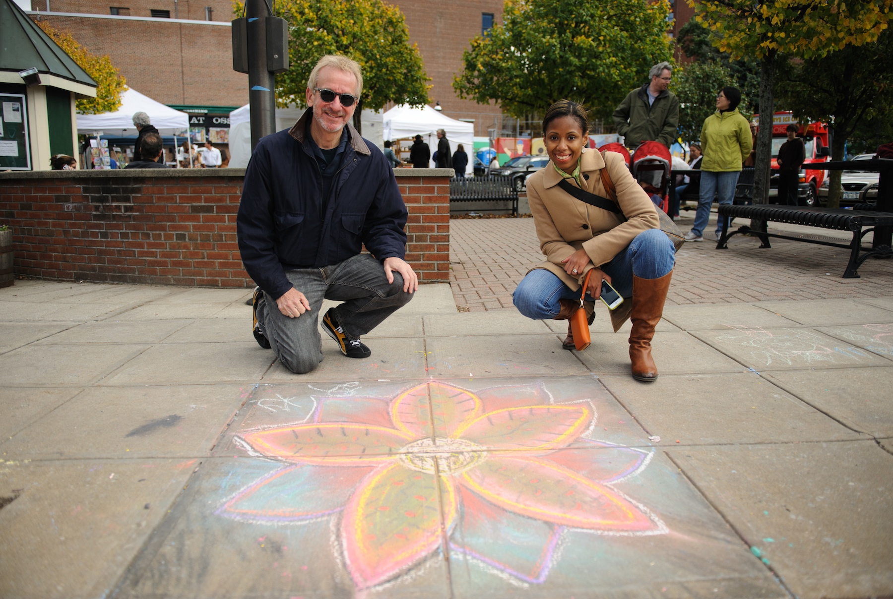Ossining Village Manager Richard Leins and Ingrid Richards, Manager of Downtown & Economic Development, at the Village of Ossining’s First Annual Chalk It Up! Festival held recently at Market Square