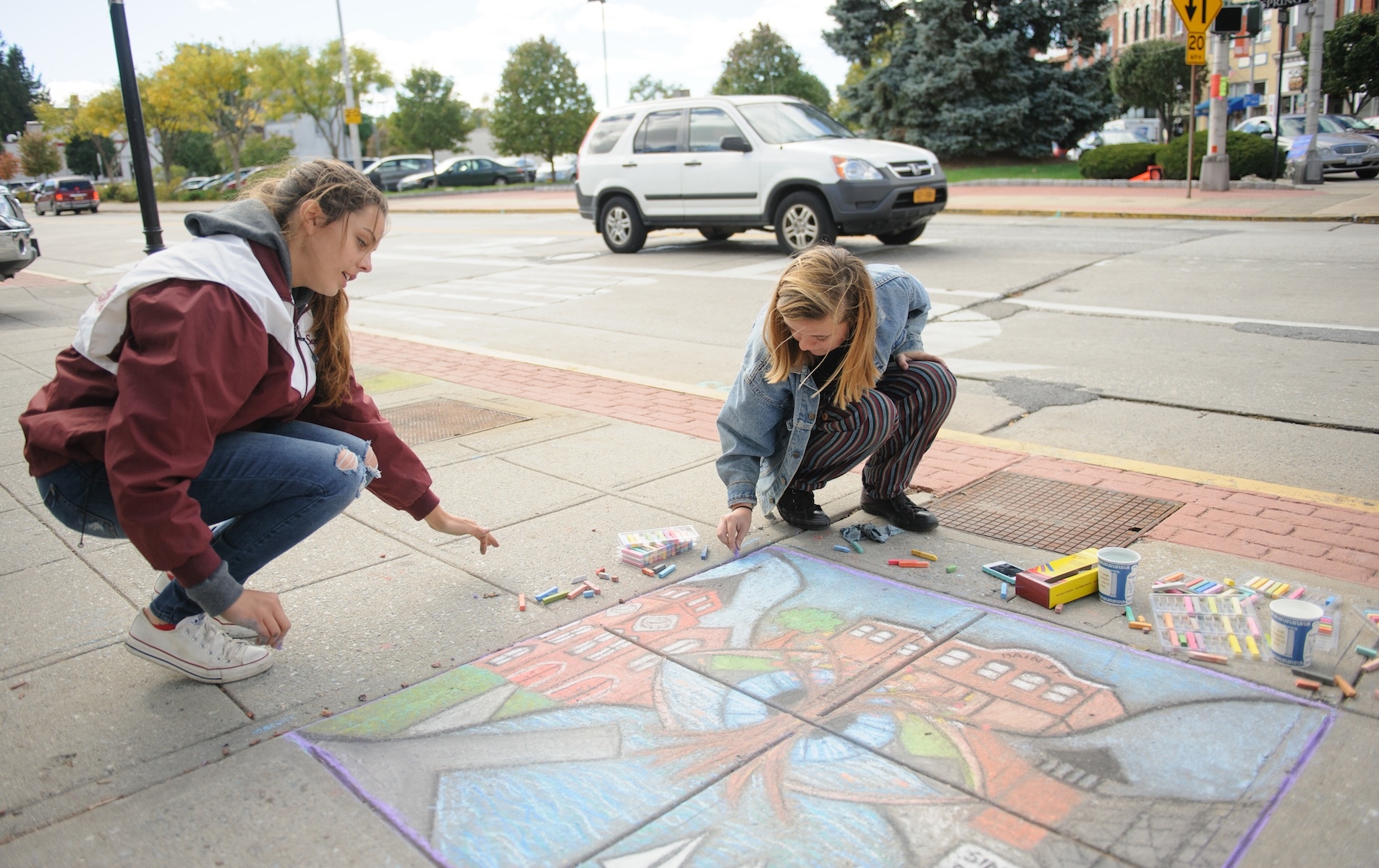 Ossining High School student artists Zoe Supina and Melissa Twomey received first place at the Village of Ossining’s First Annual Chalk It Up! Festival held recently at Market Square.