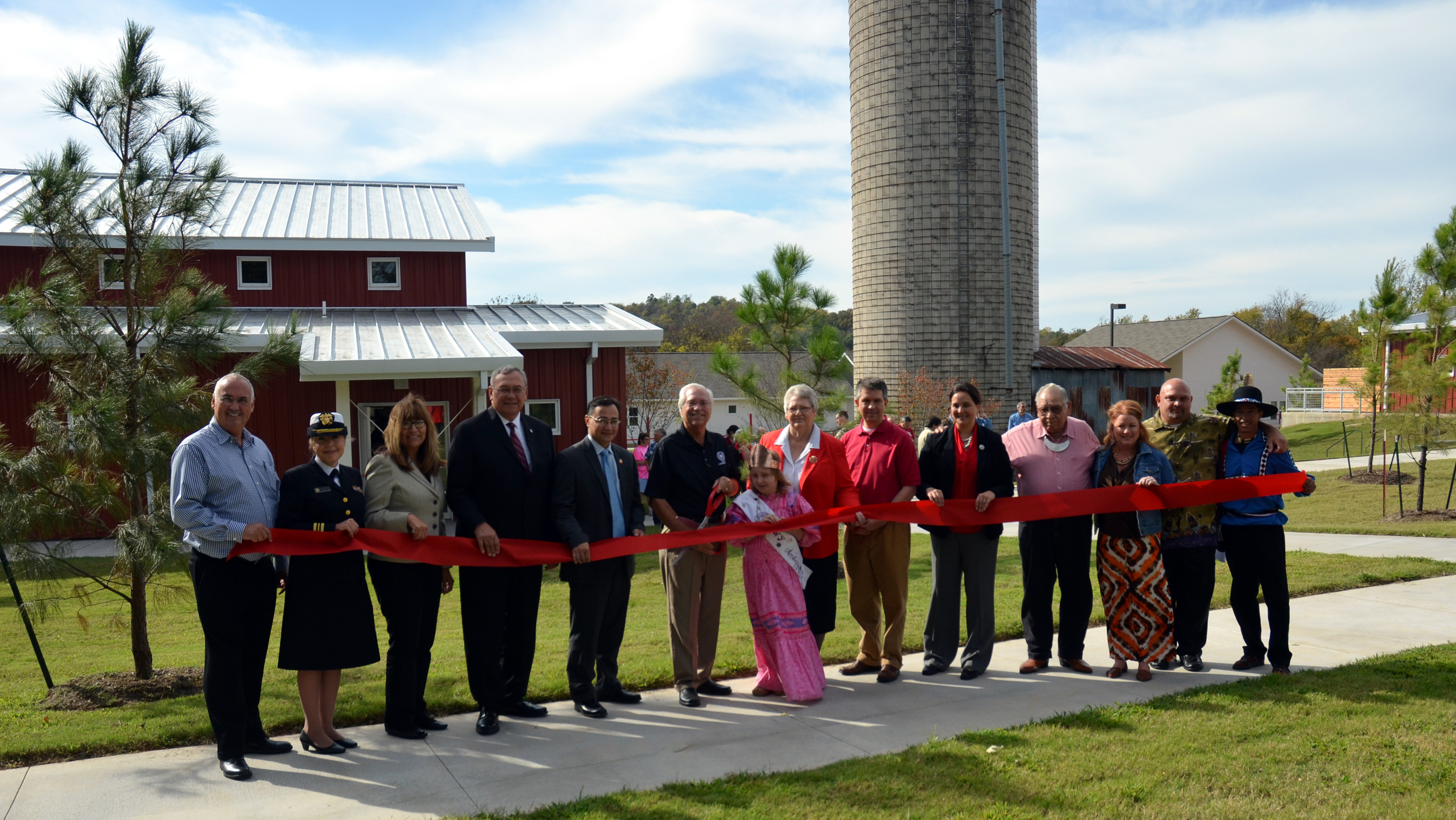 (L to R) Cherokee Nation Tribal Councilor Lee Keener; Lt. Cmdr. Karen Hearod, deputy director of behavioral health for IHS Oklahoma City Area; Jacque Hensley, Native American liaison for Governor Mary Fallin; Chief of Staff Chuck Hoskin Sr.; Secretary of State Chuck Hoskin Jr.; Principal Chief Bill John Baker; Little Cherokee Ambassador Ashlin Sutton; Tribal Council Speaker Tina Glory-Jordan; Tahlequah Mayor Jason Nichols; Tribal Councilor Cara Cowan Watts; Cherokee Spiritual Leader Crosslin Fields Smith; Health Services Executive Director Connie Davis; Jack Brown Center Director Darren Dry; and Choctaw citizen and former Jack Brown Center resident Tim Maxville.