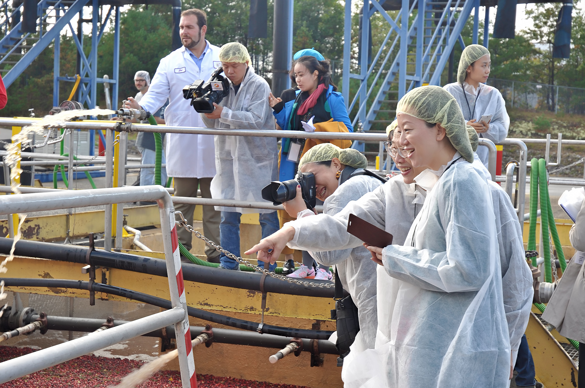 China Media Guests Visiting Cranberry Processing Facility