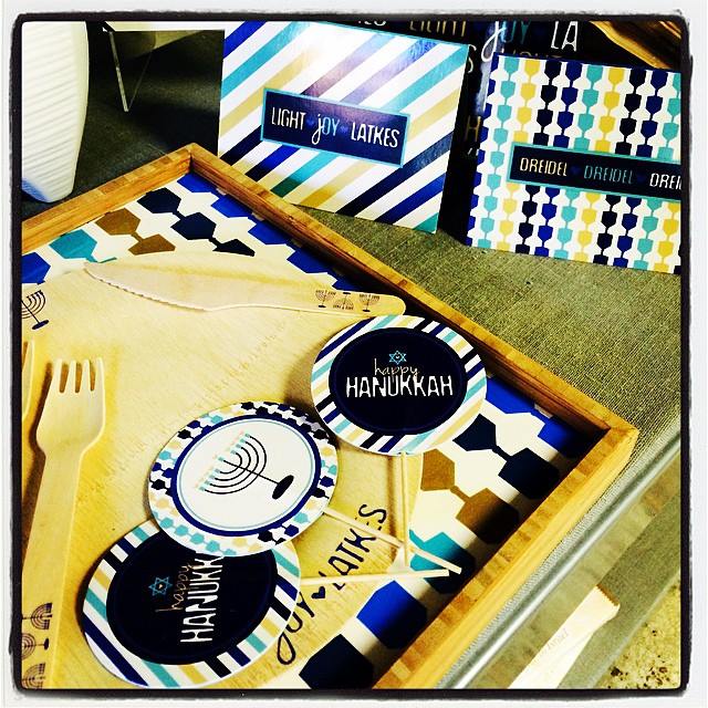 ModernTribe took the "Light, Joy, Latkes" design and made plates, utensils, greeting cards, cupcake toppers and more.