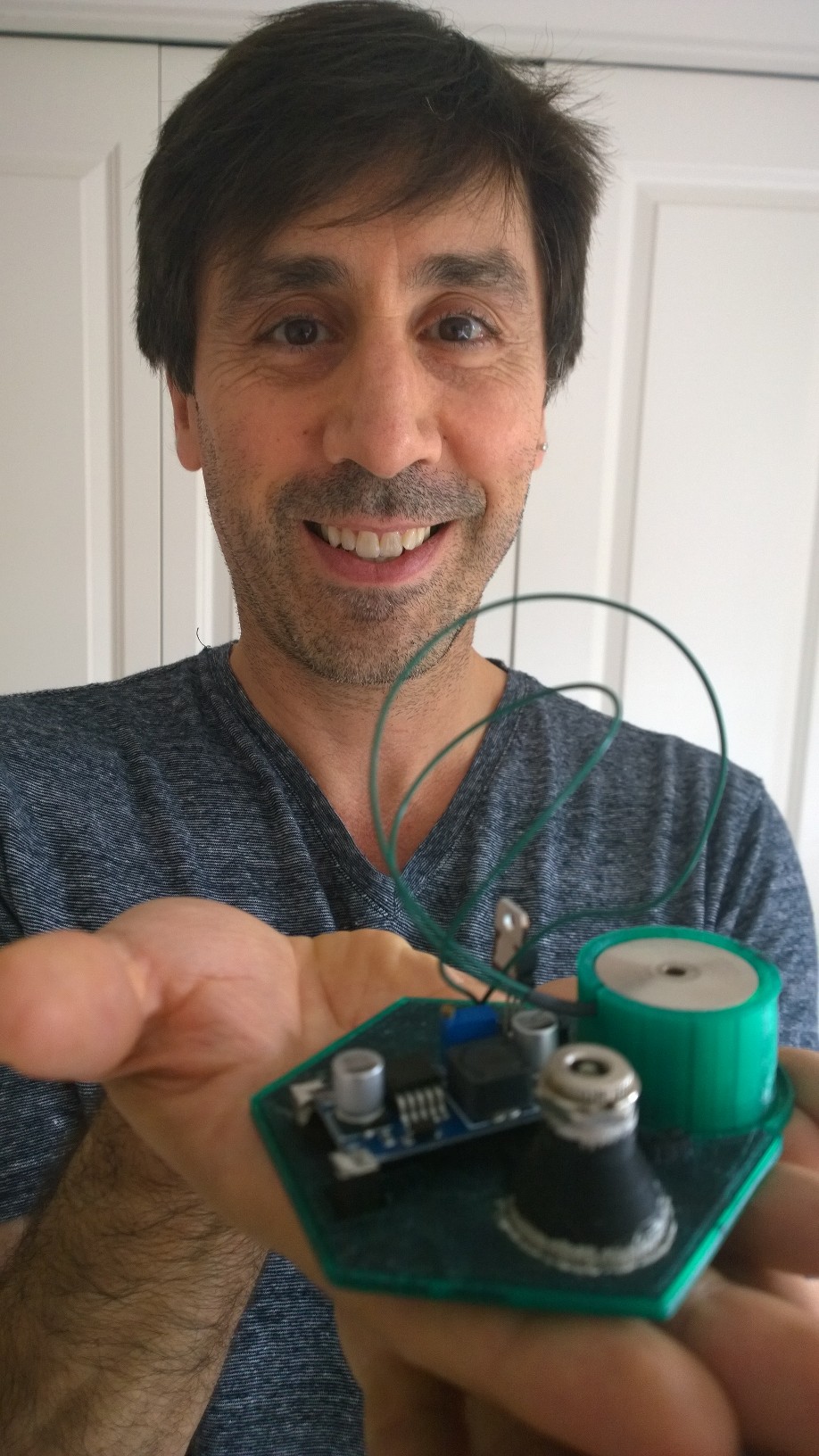 Mike Toutonghi, Functionalize’s founder, CEO and chief scientist, with 3D printed electronically conductive circuit board
