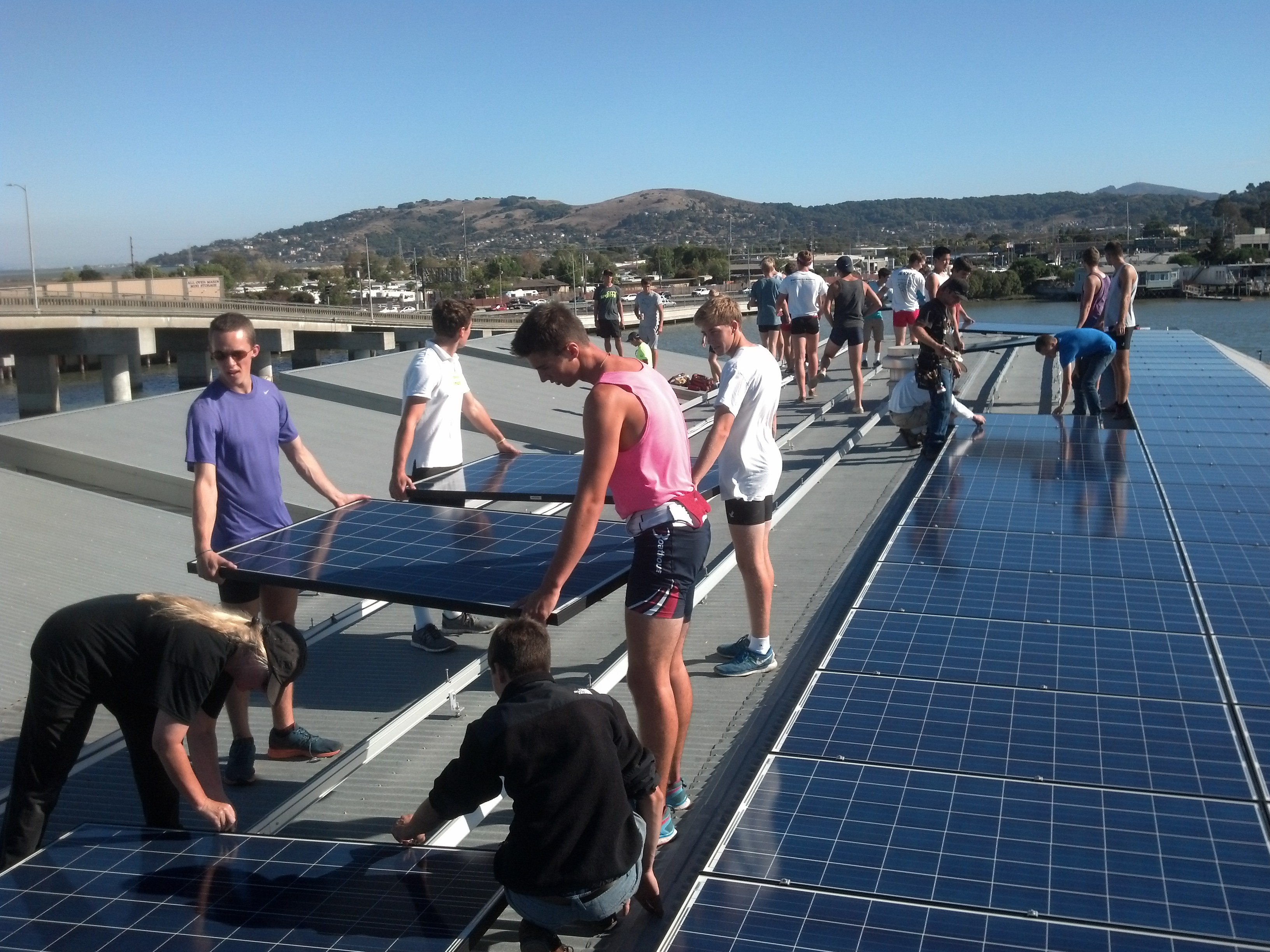 Installing solar panels at the Marin Rowing Association