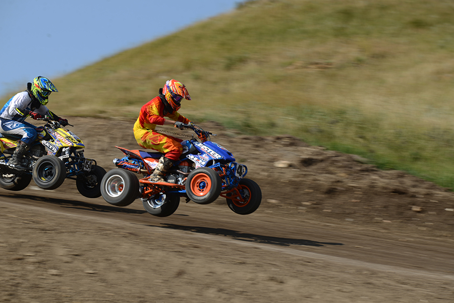 ATVs race at speeds in excess of 70 mph on the Buffalo Chip PowerSports track last August.