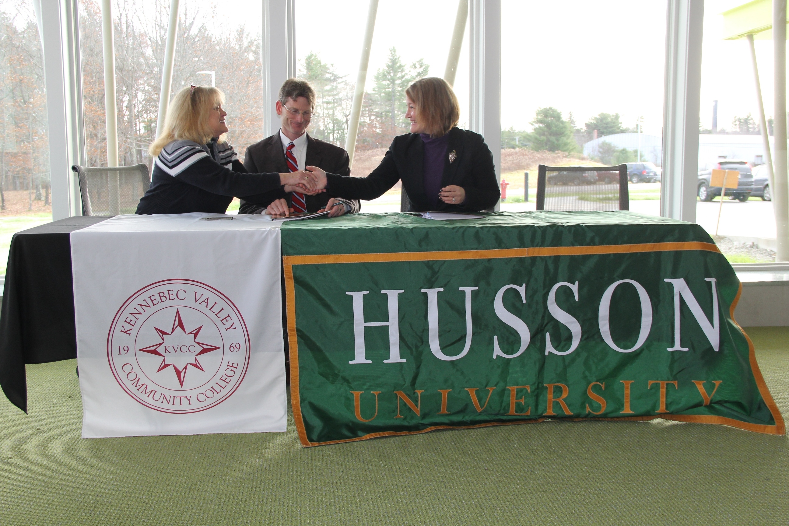 Celebrating their agreement are (from left to right), Marjorie York, KVCC; Dr. Jon Connolly, KVCC; and Dr. Marie Hansen, Husson University.