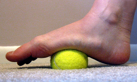 After a long day on your feet, treat them to a massage with a tennis ball, golf ball, or refloxology roller