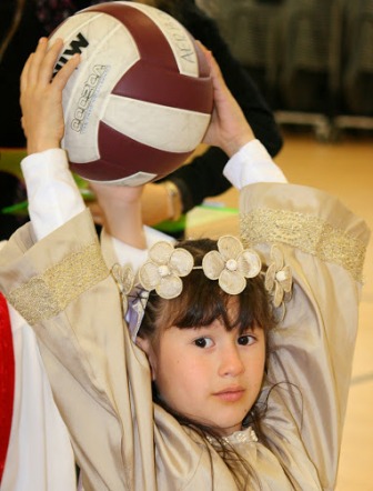 Saint Isabelle passes the ball back in one of the All Saints Day competitions.