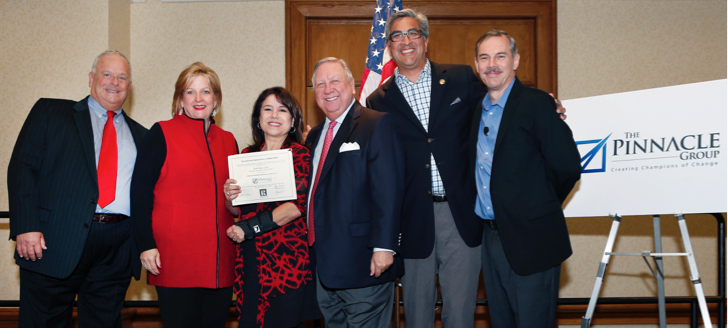 Houston Association of REALTORS leadership at graduation ceremony with The Pinnacle Group team