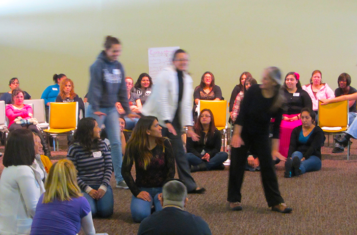 Teachers learning the math song "Animal Playground"