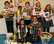 Everest Academy students helped to collect various personal items and household items for the guests who will be attending the Community Christmas Bash.
