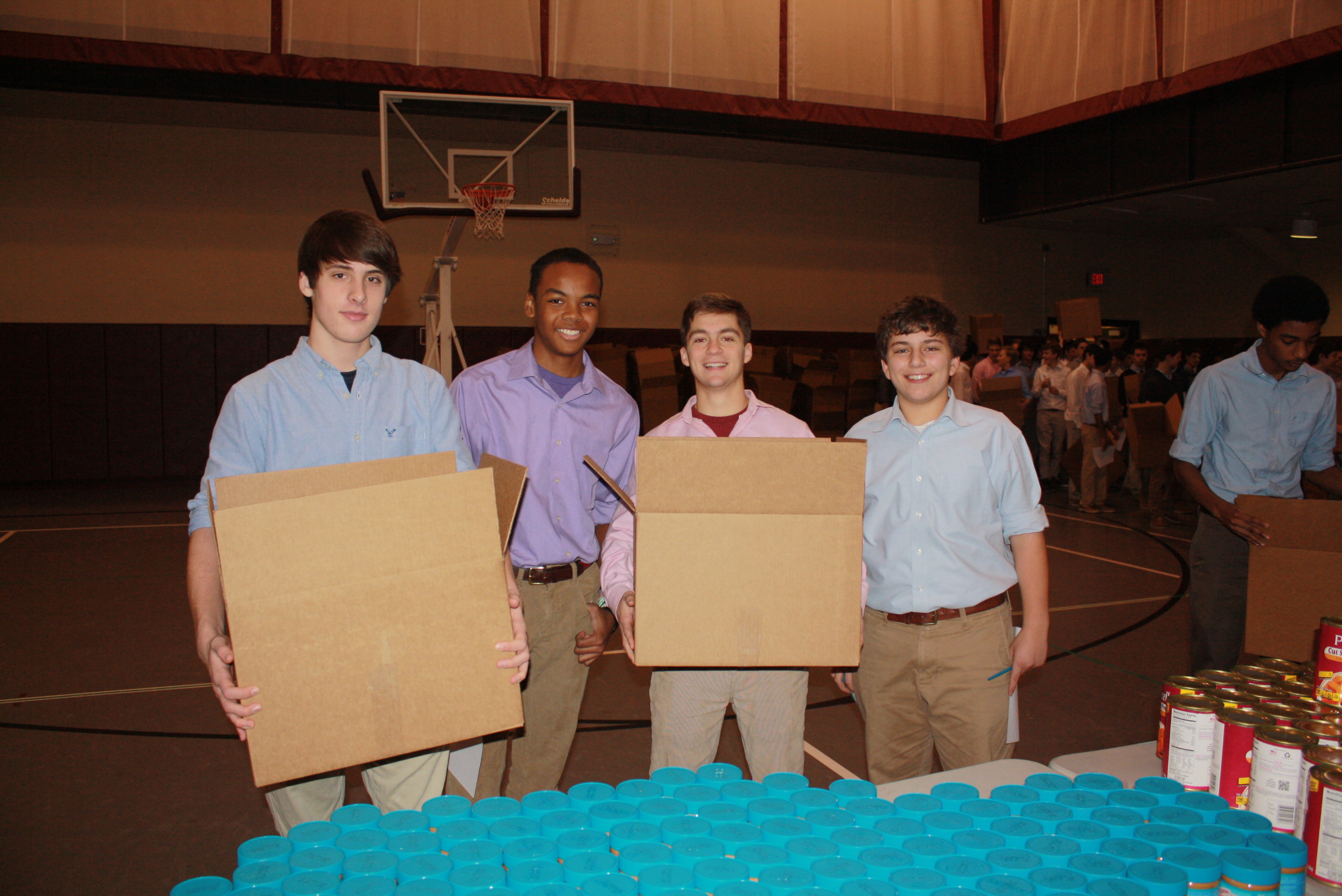 Upper School students at University School lend a helping hand for the Thanksgiving food drive.