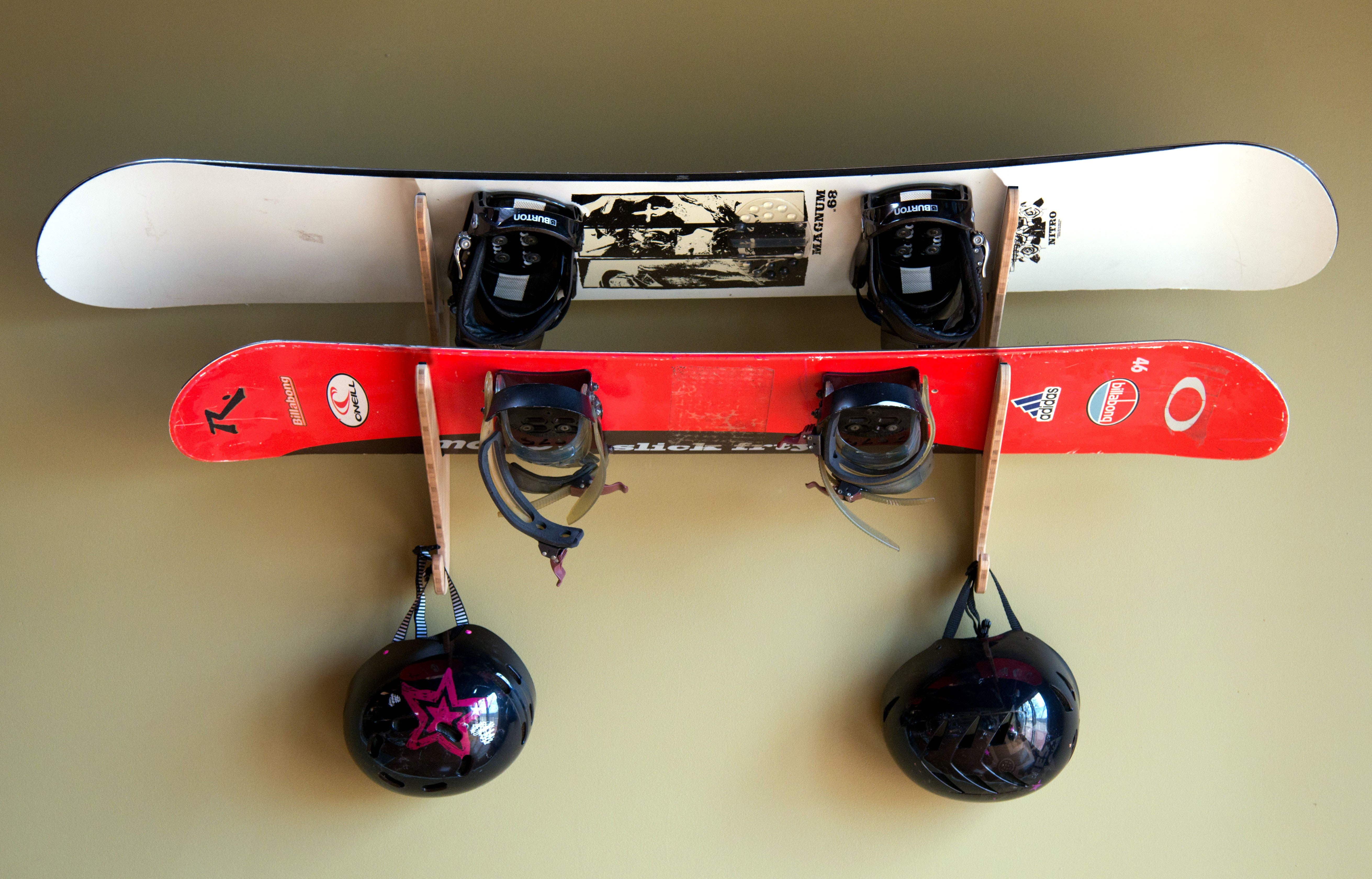 The Moloka'i Duo displaying two snowboards