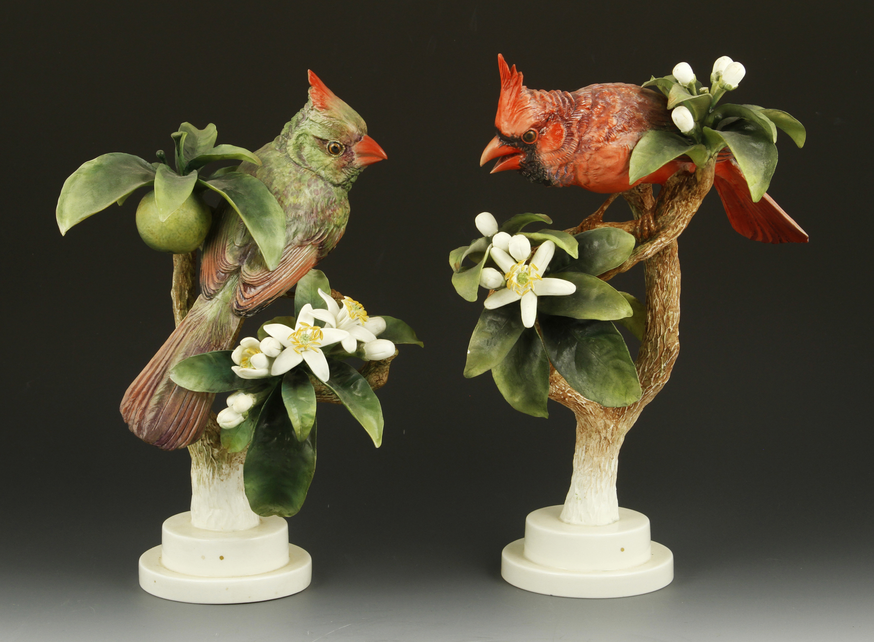 Pair of Royal Worcester Red Cardinals, porcelain, modeled by Dorothy Doughty, tallest 10 1/2" h.