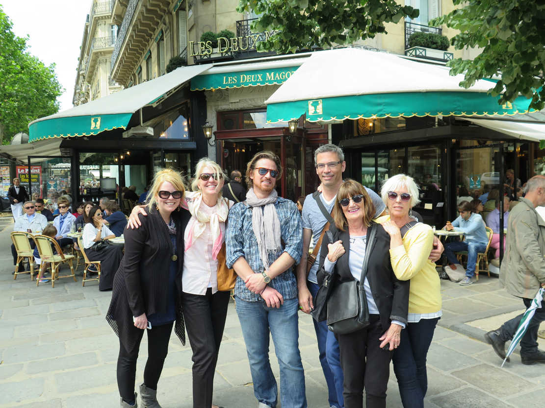 Writers of the Left Bank Writers Retreat gather in front of cafe Les Deux Magots in Paris.