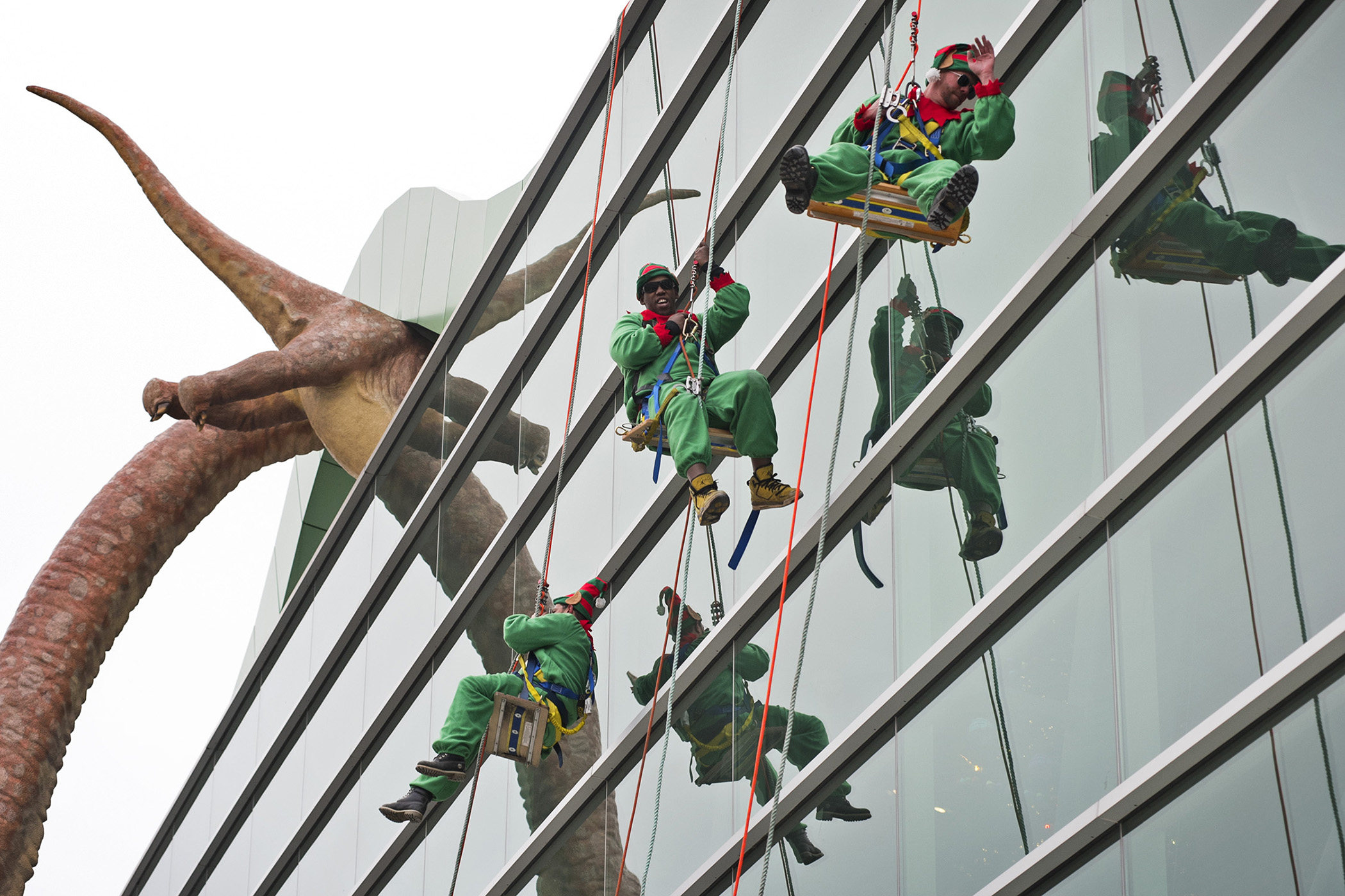 Elves rappel off the roof of The Children's Museum of Indianapolis