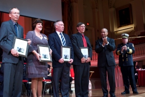 From left, Professors Orr, Notarianni,  Duckworth, and Cyganski receive the 2012 Massachusetts Fire Marshal’s Award from Governor Deval Patrick for their research on first responder technology.