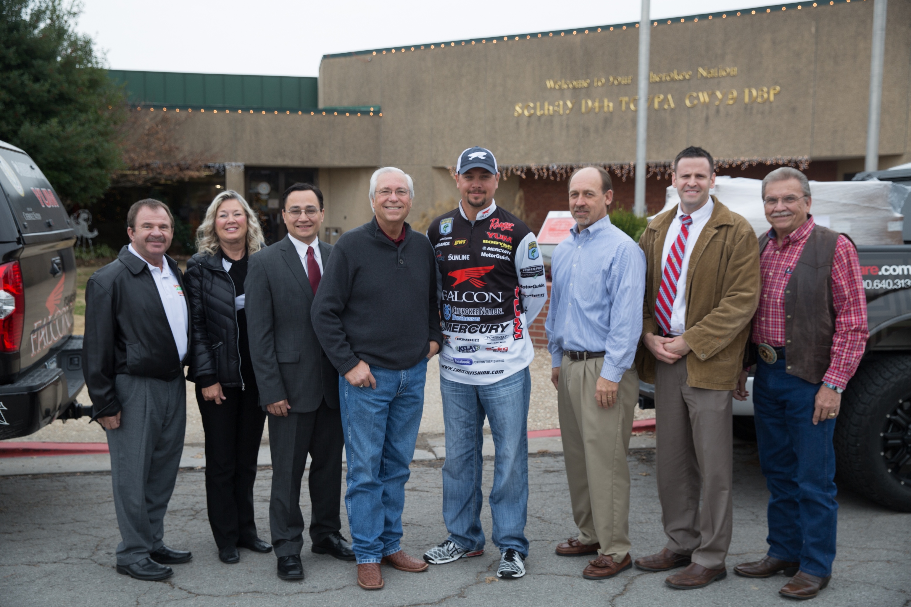 Cherokee Nation officials receive donation from Hunger Buster Beef Cuts, thanks to a partnership with professional angler and Cherokee Nation citizen Jason Christie. (L to R) Richard Cranford, owner of QuarterShare LLC; Janice Randall, executive director of The Cherokee Nation Foundation; Cherokee Nation Secretary of State Chuck Hoskin Jr; Cherokee Nation Principal Chief Bill John Baker; Jason Christie, professional angler; Jim Enneking, fishing buyer for Wal-Mart Stores; Cherokee Nation Tribal Councilor David Walkingstick; and Cherokee Nation Deputy Chief S. Joe Crittenden.