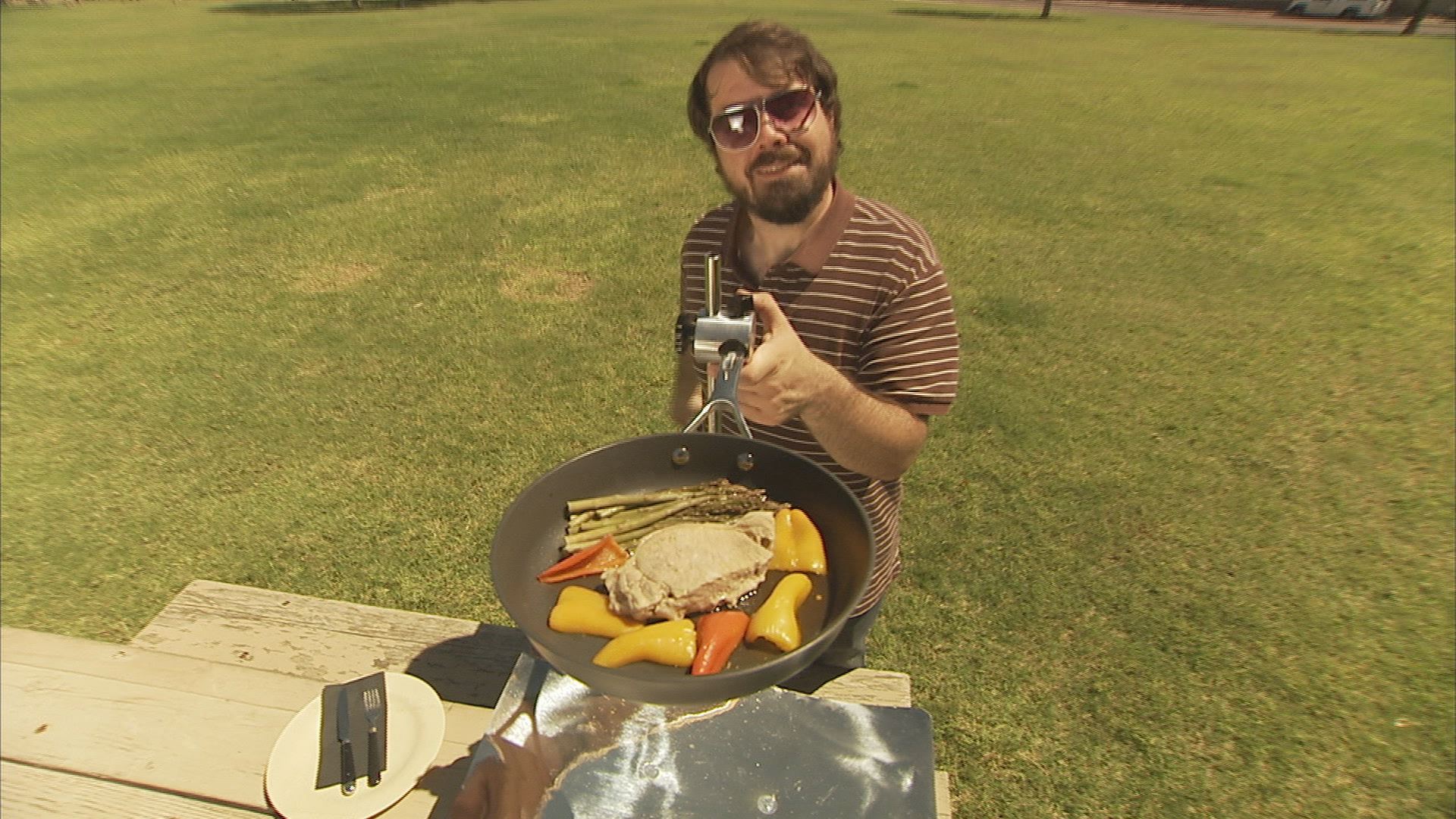 Travis Williams, outdoor enthusiast, demonstrates the Sol-Man Solar Cooker. Help fund at kickstarter.com.