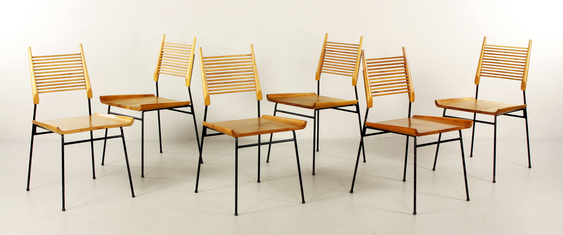 Set of six Paul McCobb dining chairs for Planner, Winchendon, maple and iron, circa 1950, marked with labels on five of six