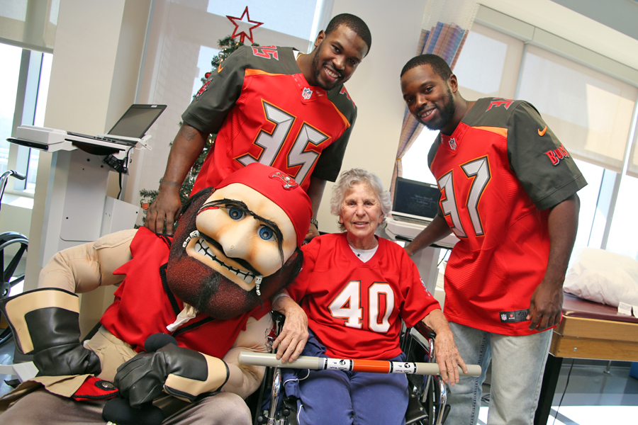 Players Tandy and Glaud visit patients on the Rehabilitation Unit at Florida Hospital Tampa