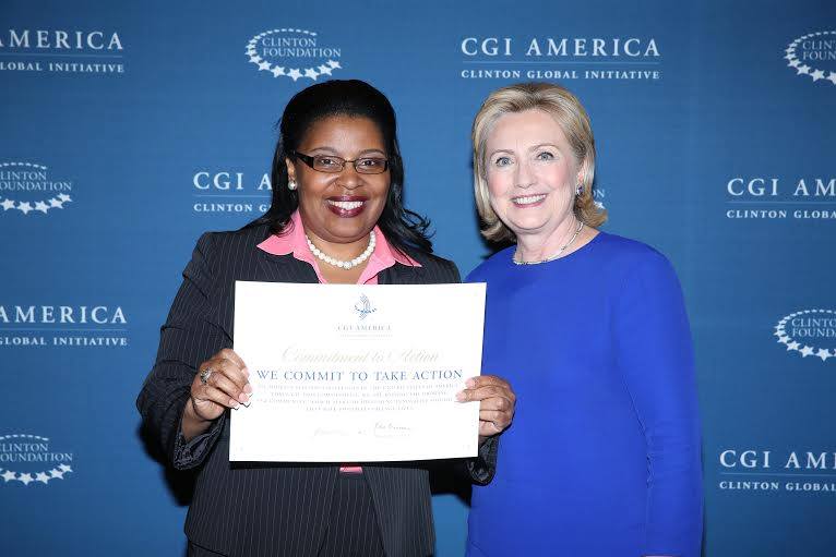 WVI President with former Secretary of State Hillary Clinton at the Clinton Global Initiative in Denver, Colorado.