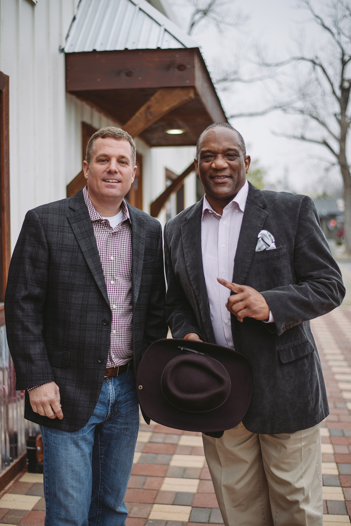 Billy Sims BBQ President Jeff Jackson with Heisman trophy winner Billy Sims