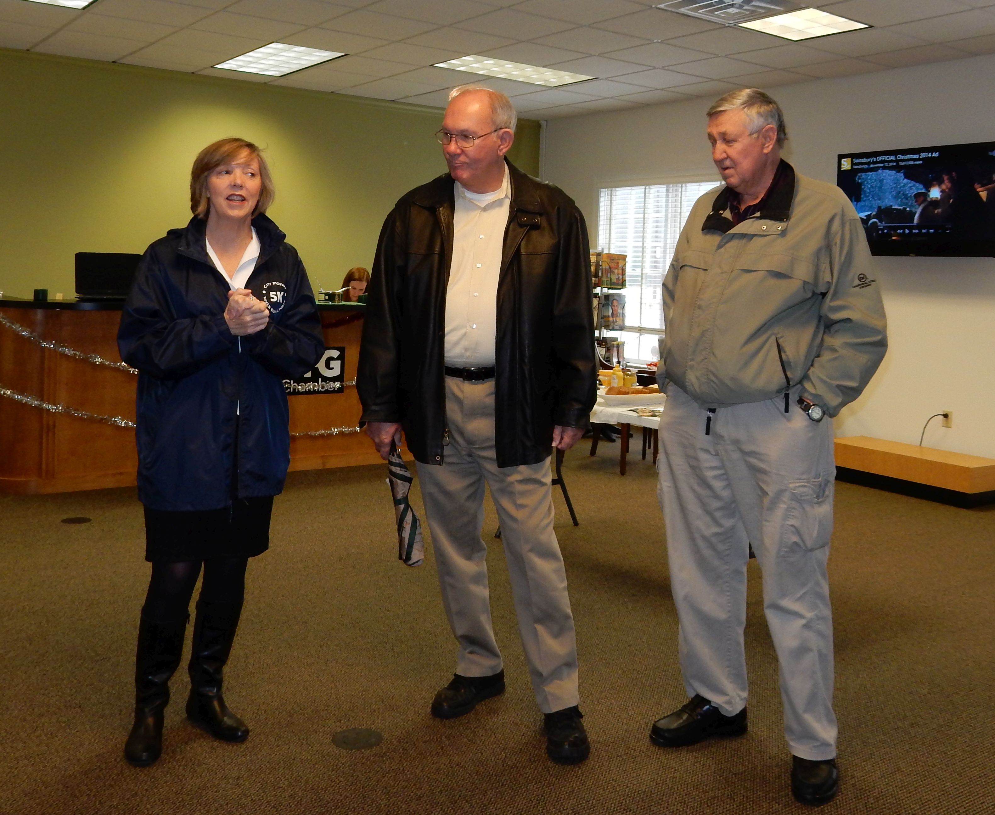 Becky McDonough welcomes guests to the Hopewell/Prince George Visitor Center with  Bill Robertson, chairman of the Prince George County Board of Supervisors, and  PG Board Member Jerry Skalsky.