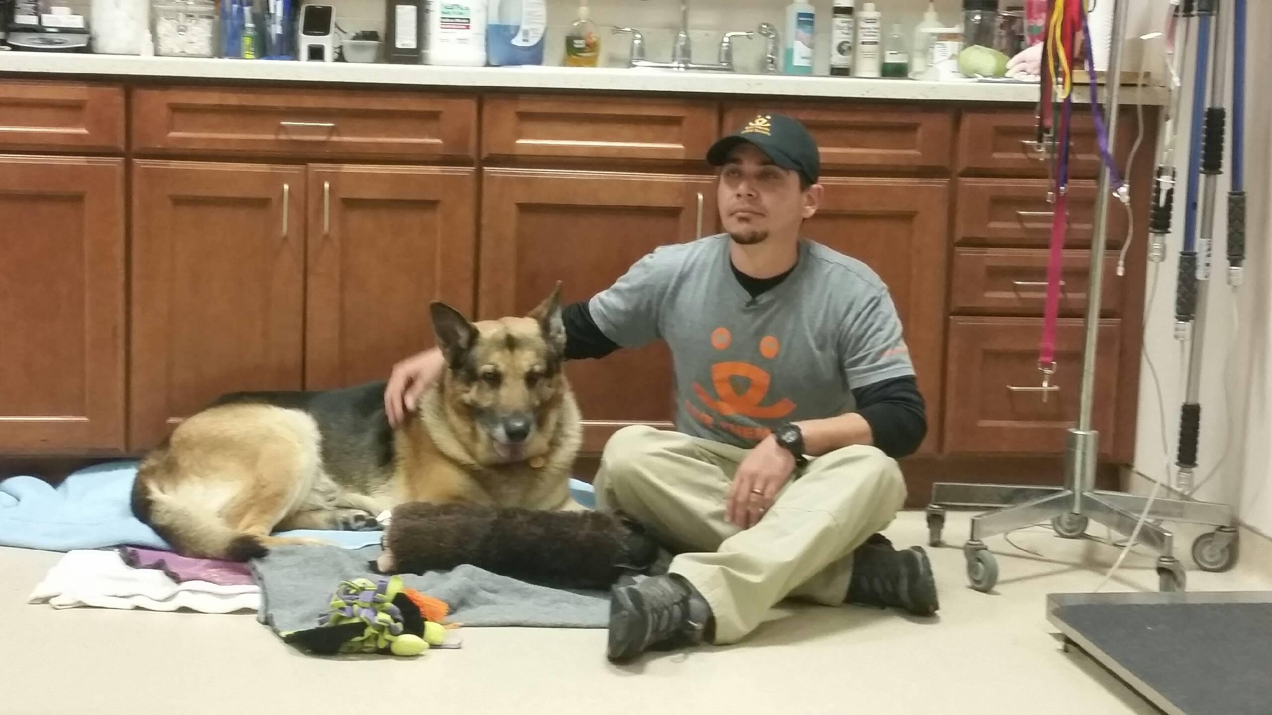 Best Friends Animal Society's John Garcia and Bela the dog get acquainted